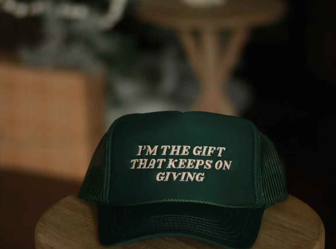 I’m the gift that keeps on giving trucker hat