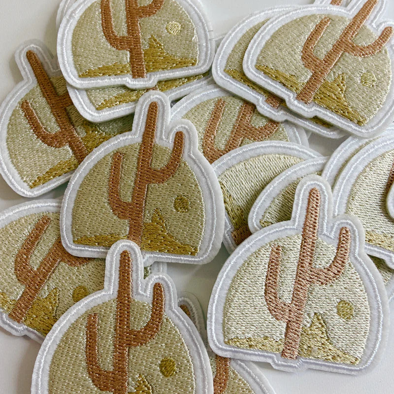 Tan cactus patch