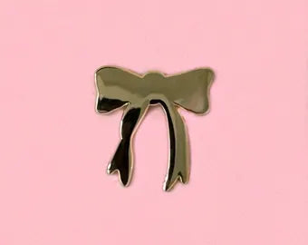 Gold bow pin