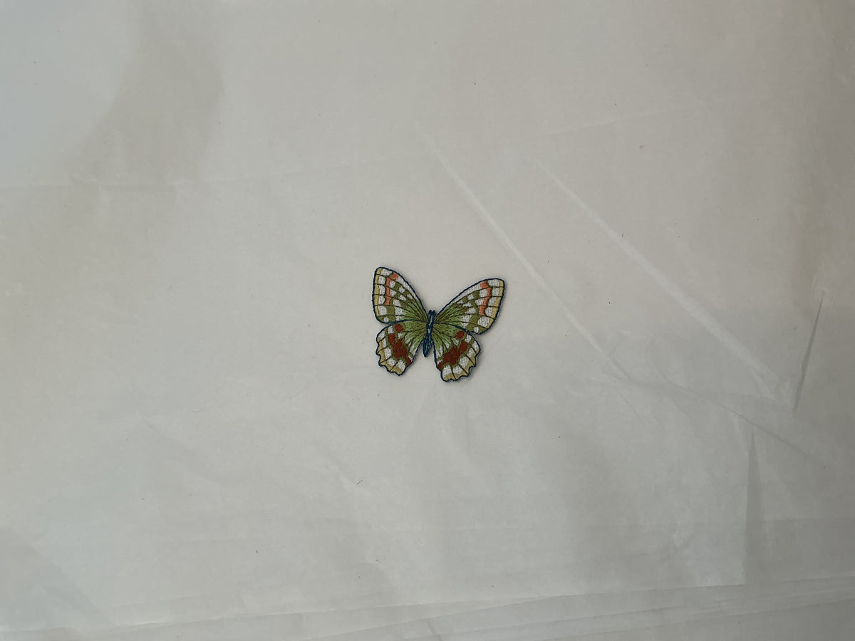 Green butterfly patch