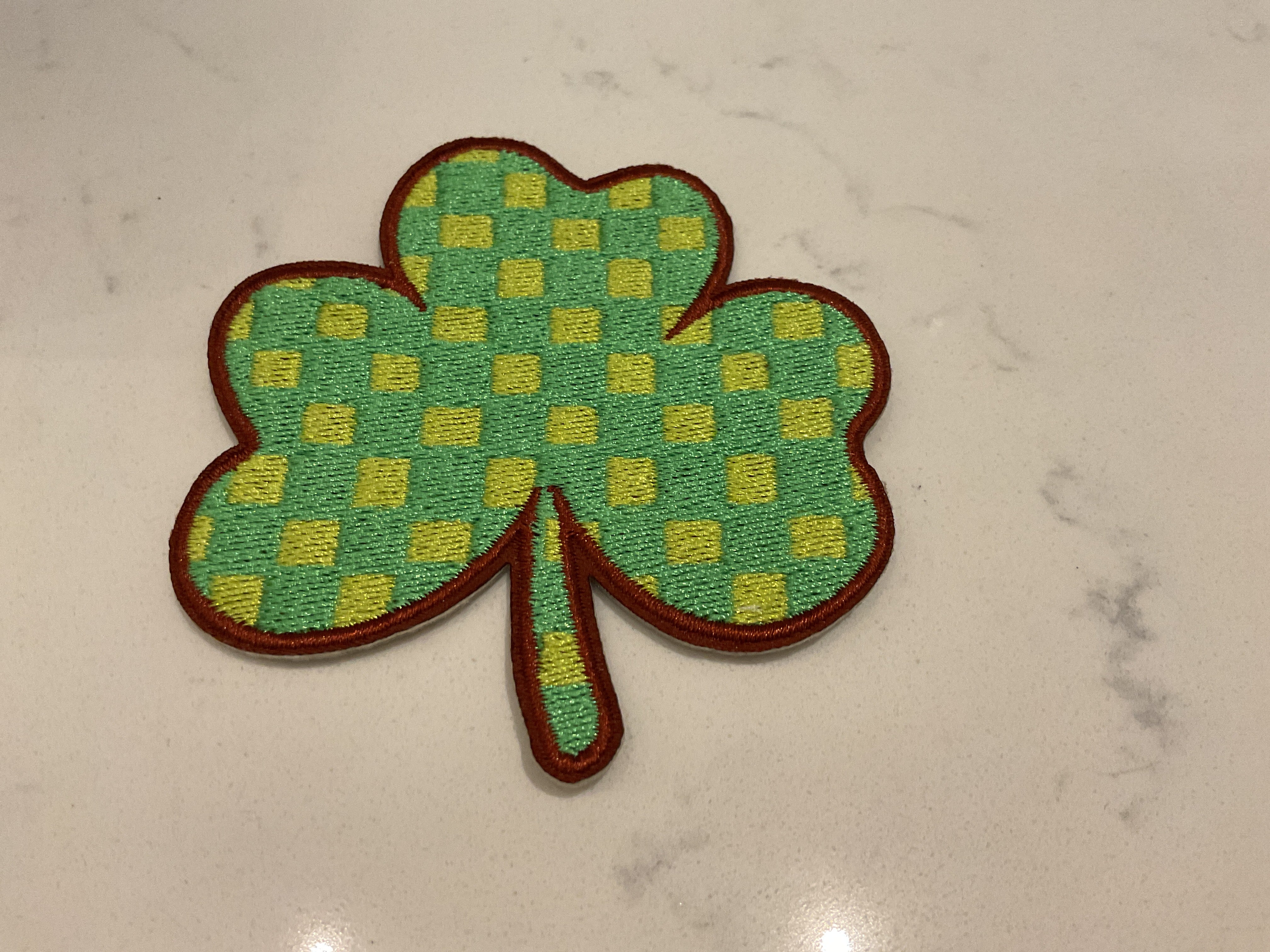 Checkered shamrock patch