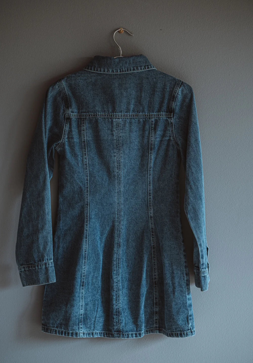Denim mini dress with button