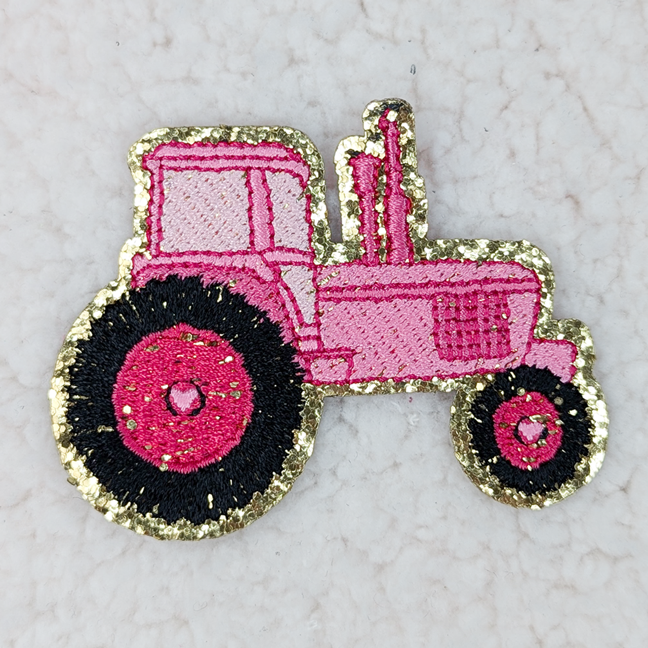 Pink glitter tractor
