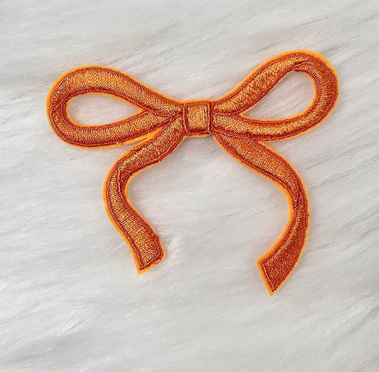 Orange bow patch