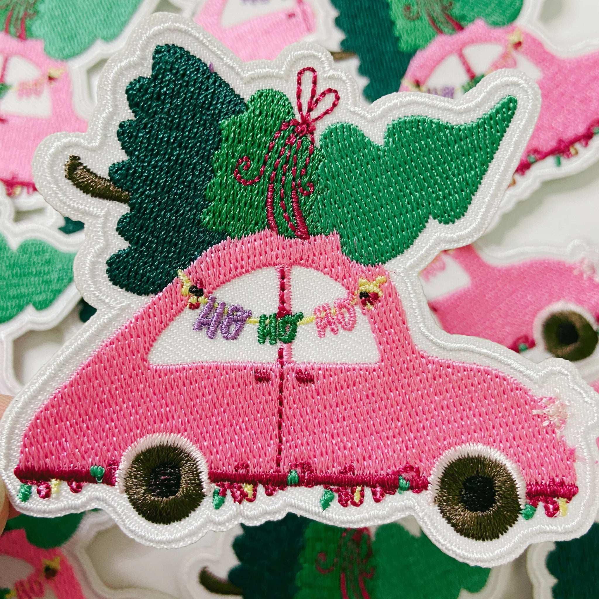 Pink car with Christmas tree patch