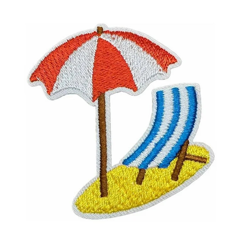 Chair with umbrella on the sand patch