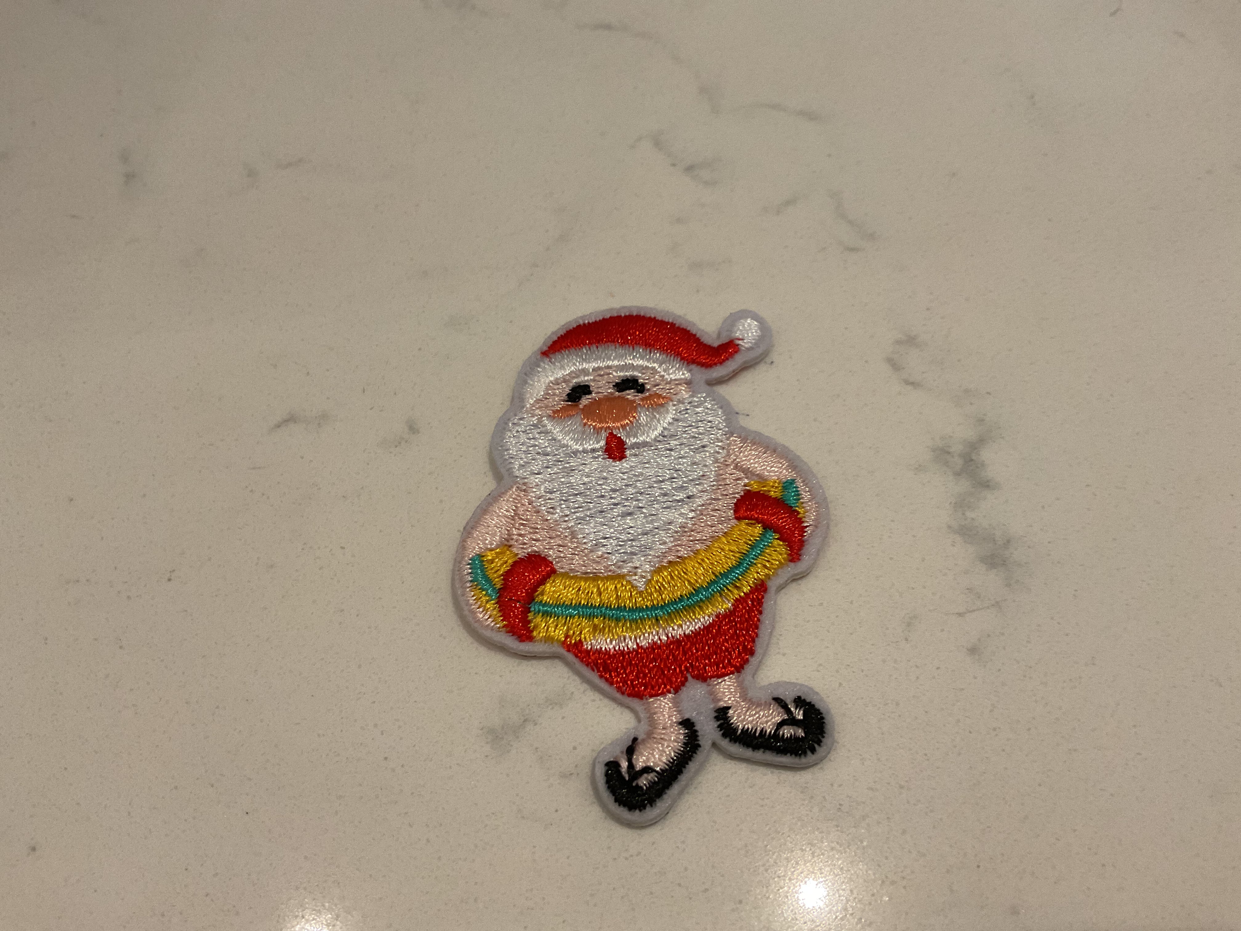 Santa in an inflatable ring patch
