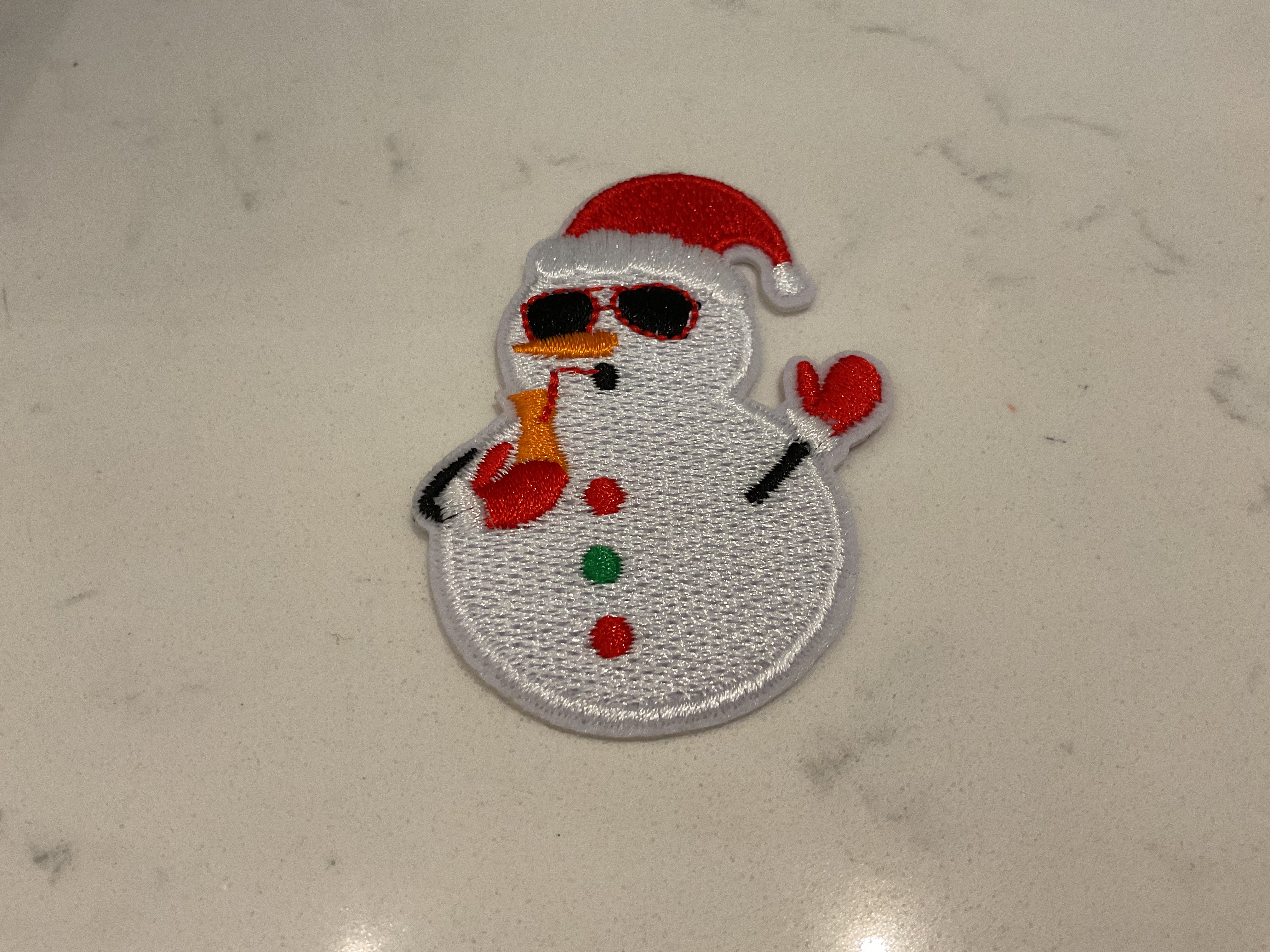 Snowman drinking a drink patch
