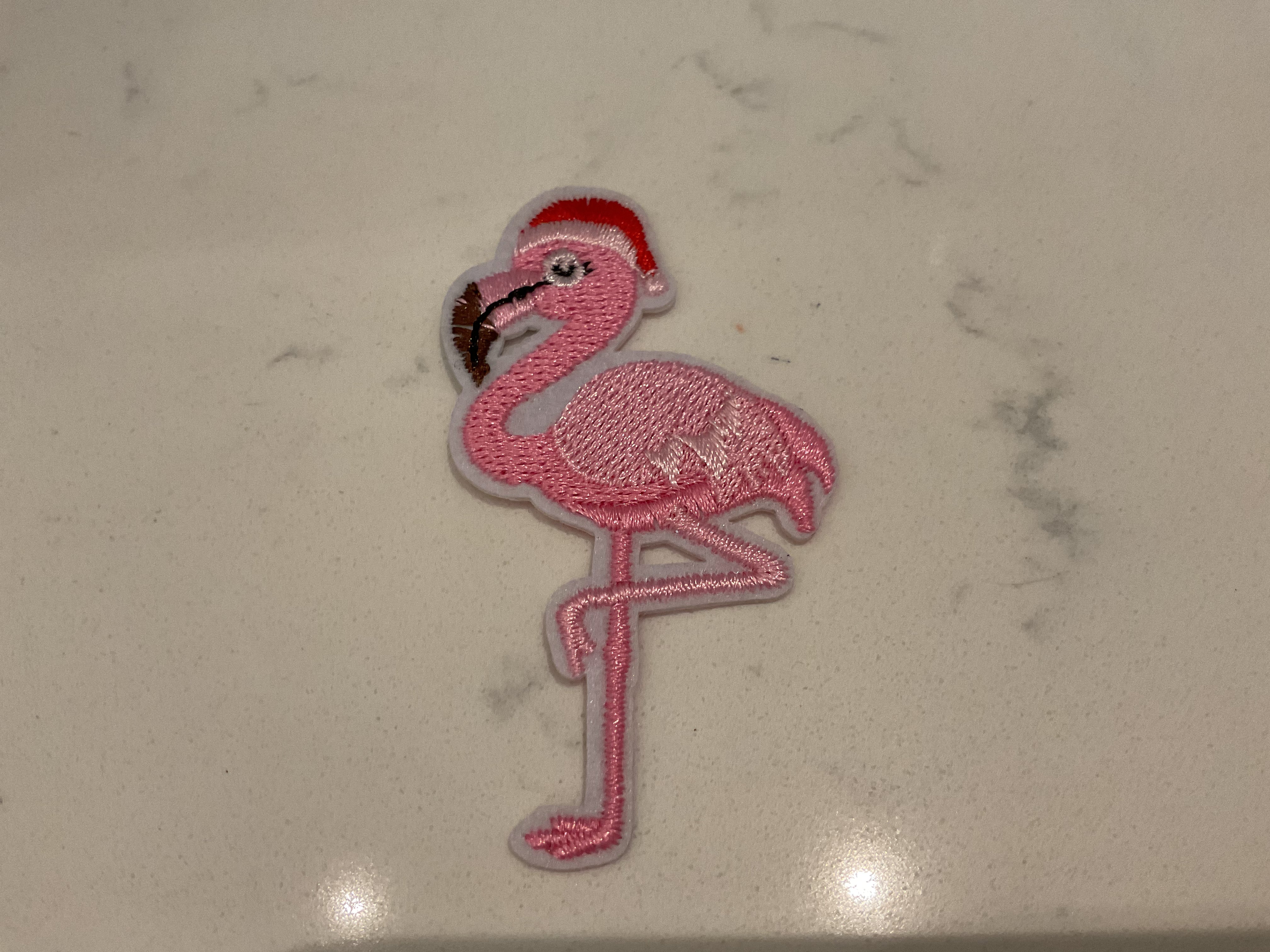 Flamingo with Santa hat patch