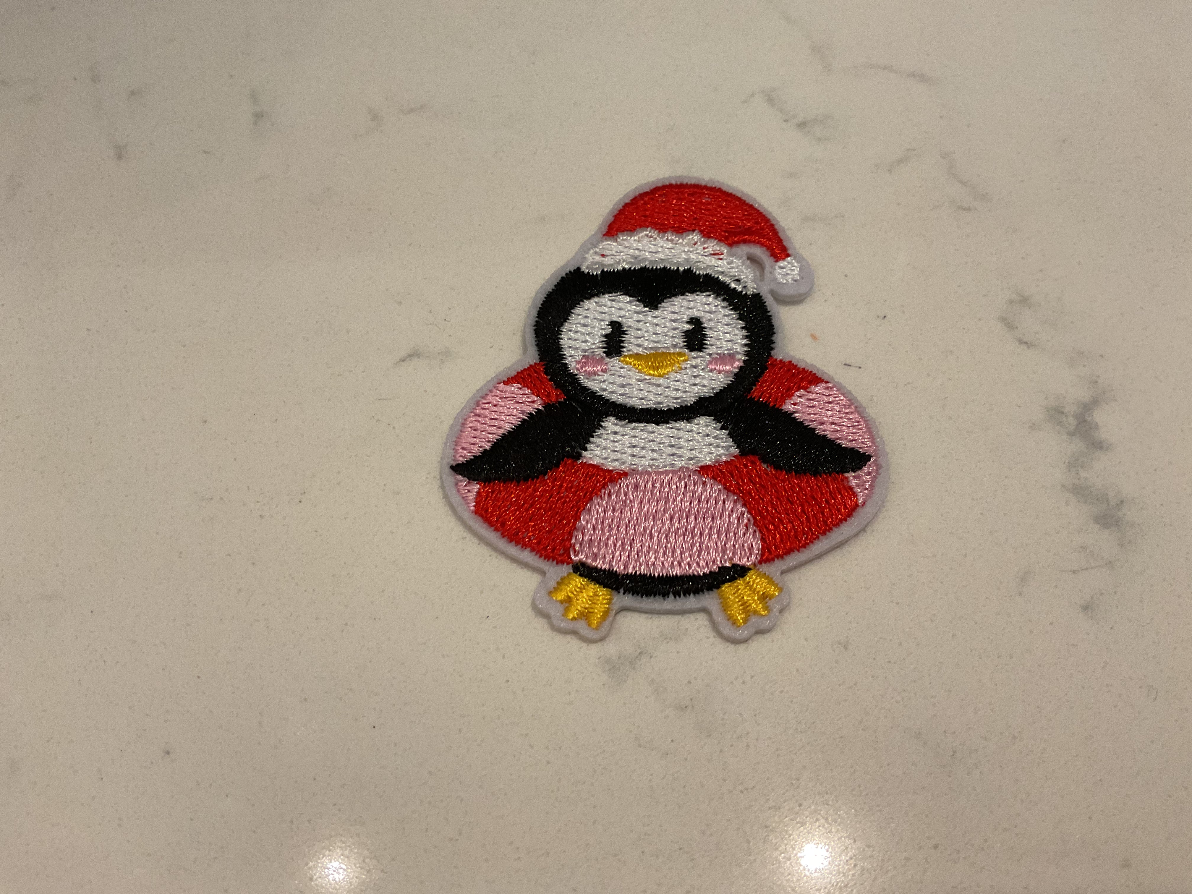 Penguin in floaty patch