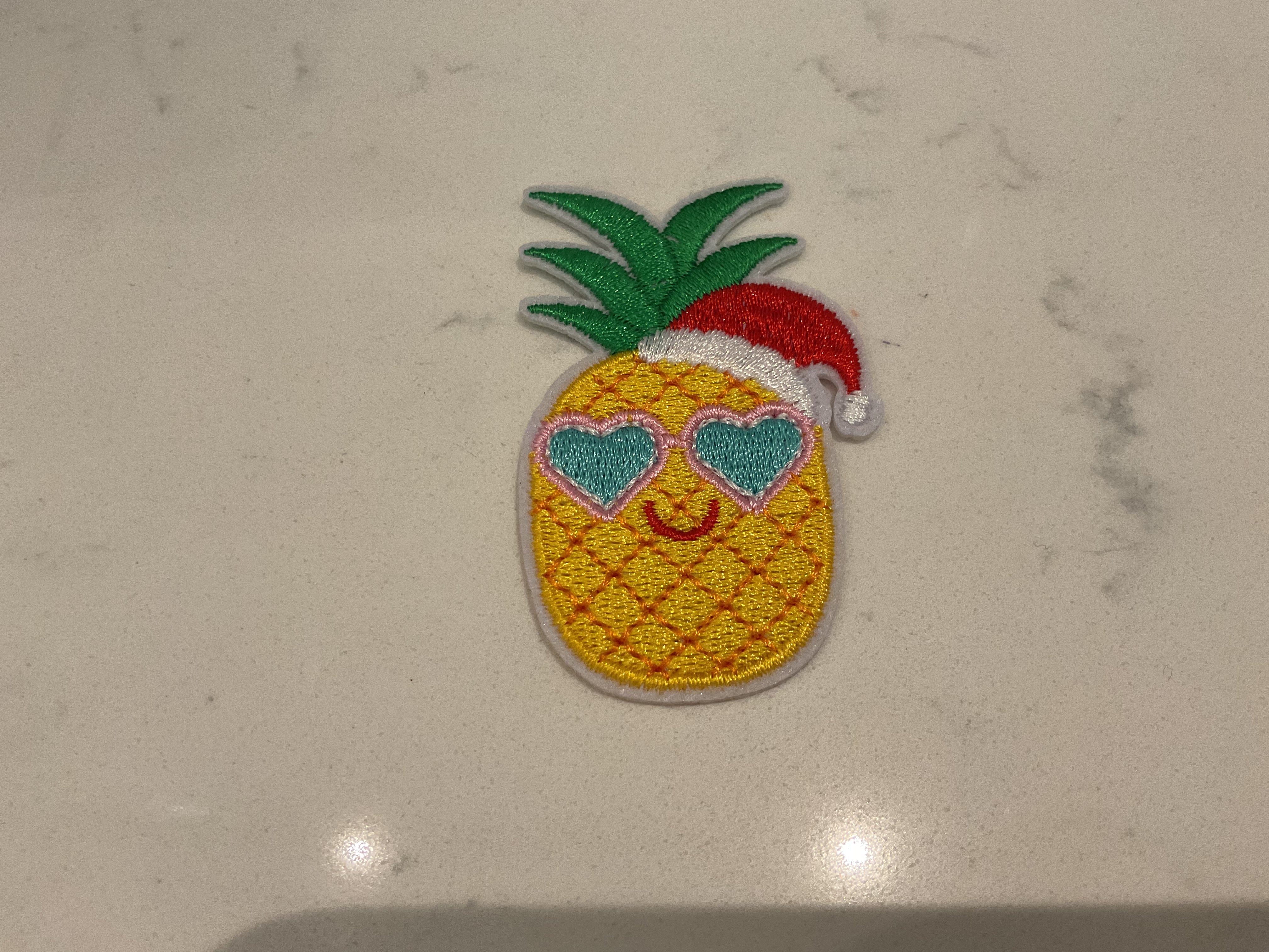 Pineapple with Santa hat patch
