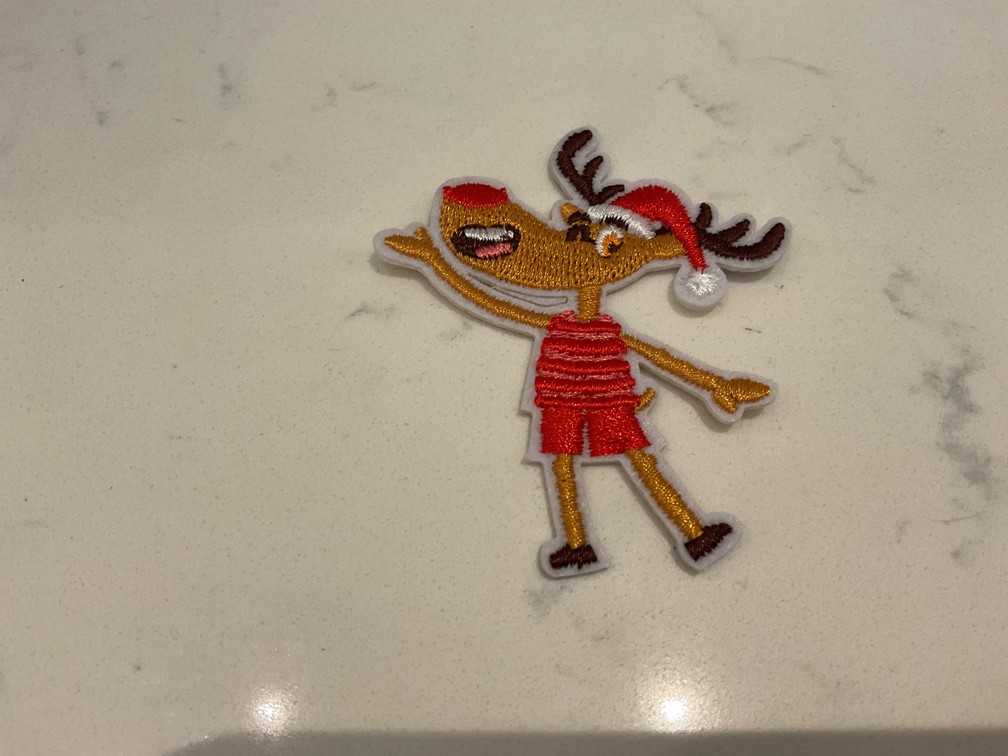 Reindeer with Santa hat patch