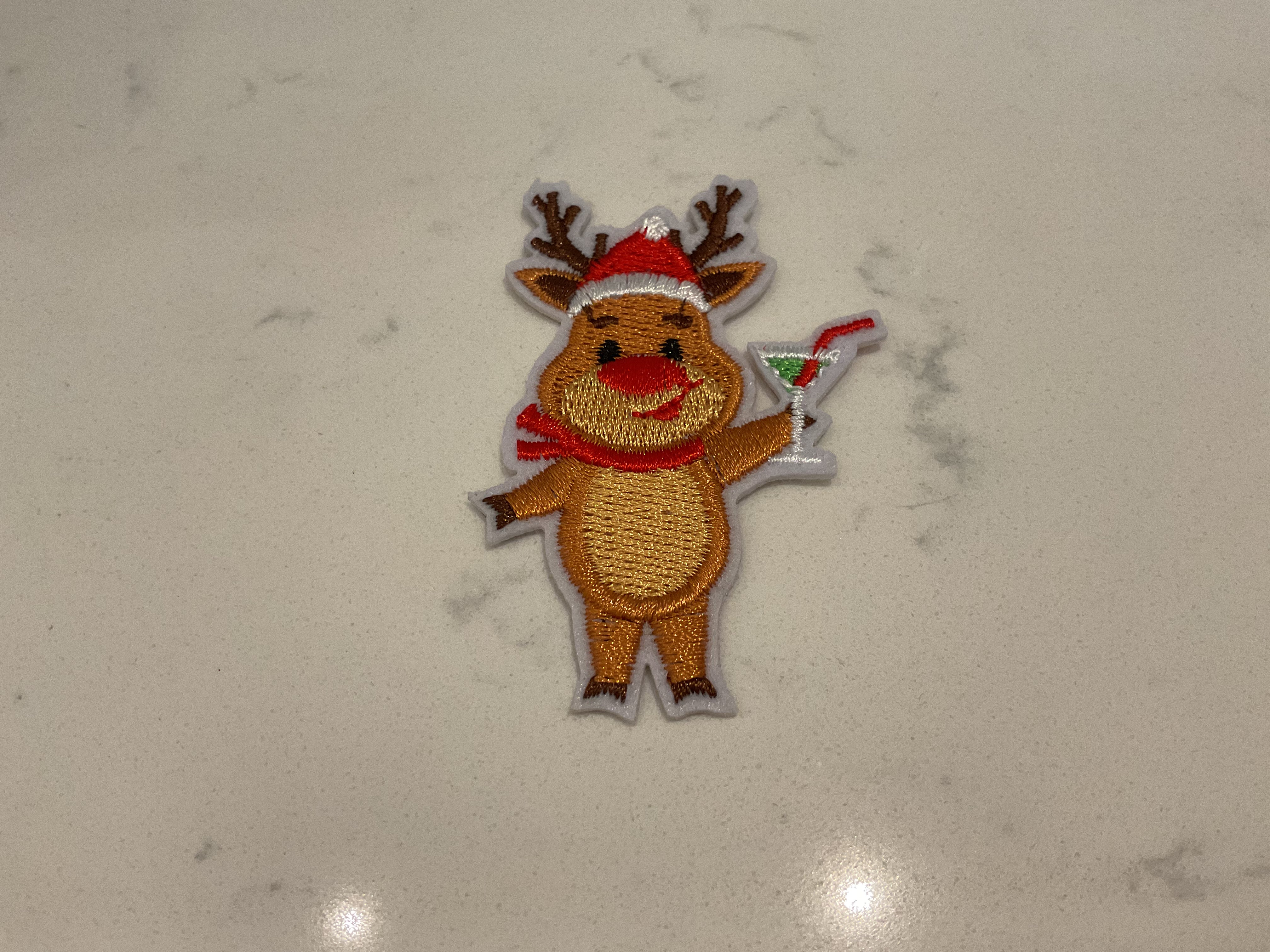 Reindeer holding a drink patch